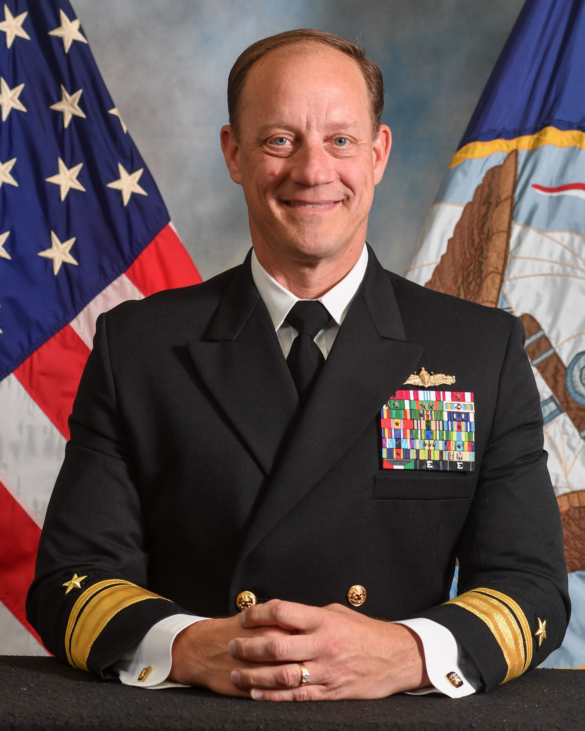 Rear Adm. Robert Nowakowski poses for his official photo. (U.S. Navy photo by Mass Communication Specialist 1st Class Claire DuBois)